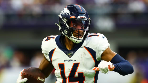 Denver Broncos wide receiver Courtland Sutton (14) runs with the ball in the first quarter against the Minnesota Vikings at U.S. Bank Stadium.